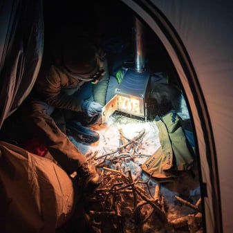 Hunter accessing exclusive Gear Fool perks like free shipping and rewards on premium hunting equipment via Huntin' Fool membership